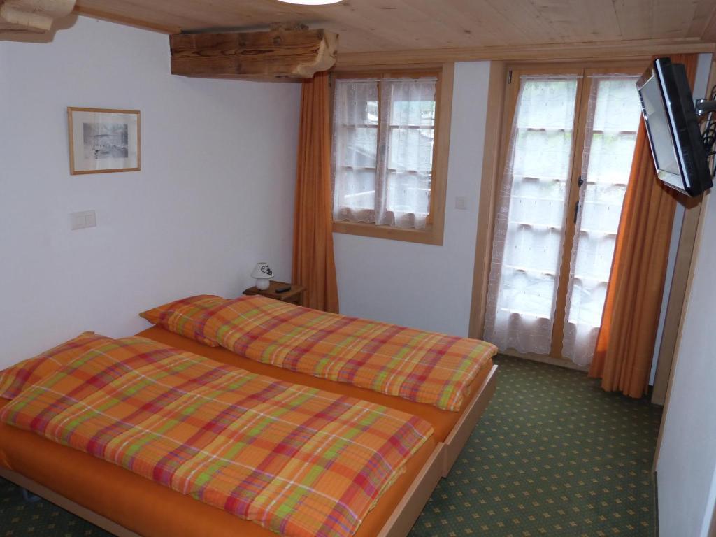 Hotel De Ville Rossinière Pokoj fotografie