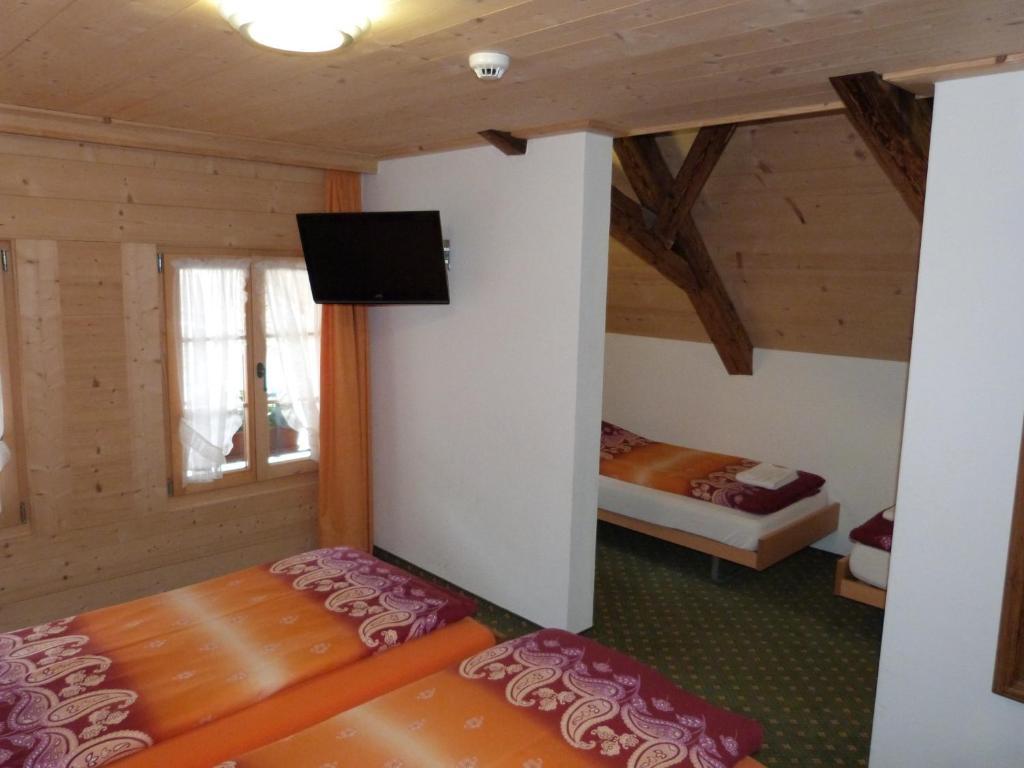 Hotel De Ville Rossinière Pokoj fotografie