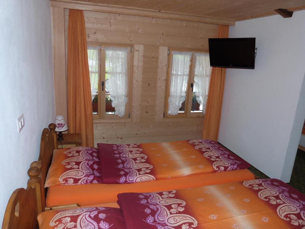 Hotel De Ville Rossinière Pokoj fotografie